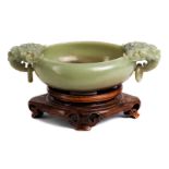 Chinese jade bowlDiameter incl. handles: 21.8 cm. Label by Kwok Gallery PTE LTD Singapore on base.