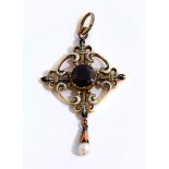 Enamel and garnet pendant by Carlo GiulianoLength: ca. 5.5 cm. Weight: ca. 8.7 g. 18 ct yellow gold.