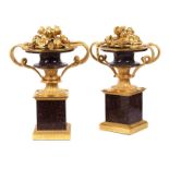 Pair of magnificent, decorative porphyry and gilt-bronze vasesHeight: 38 cm each. Width: 25 cm each.