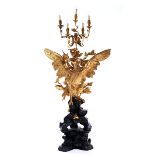 Exceptional candle holder with opulent carved decorationsHeight: ca. 220 cm. Genoa, 17th/ 18th