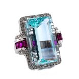 Aquamarine, diamond and ruby ringRing size: 54. Ring head size: ca. 3 cm. Weight: ca. 18.8 g. 18