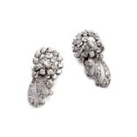 Diamond earringsLength: ca. 3.8 cm. Weight: ca. 19.5 g. Platinum. Rhodium-plated. Playful,