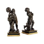 Pair of bronze sculpturesBOY WITH SMALL DOG and GIRL WITH CAT Total height: 32 cm each. Base side