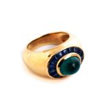 Emerald and sapphire ring by BoucheronRing size: 51. Weight: ca. 14.5 g. 18 ct yellow gold.