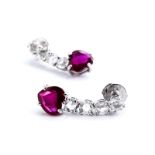 Ruby heart and diamond earringsLength: ca. 2.4 cm. Weight: ca. 5.2 g. 18 ct white gold. Flexibly