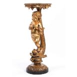 Guéridon with carved figural decorationHeight: 106 cm. Diameter of the base plate: 42 cm. 19th