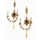 Pair of neoclassic-style appliquesHeight: 73 cm. Brass casting, gilded. Each with two lights.