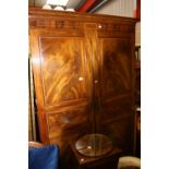 A George III style mahogany wardrobe, th