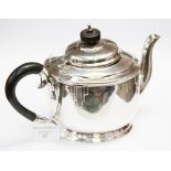 An Art Deco silver teapot, footed cylind