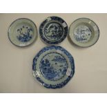 Four blue and white plates