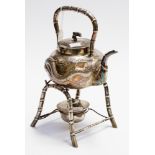 A Chinese silver teapot on stand, cast w