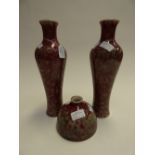 A pair of Chinese vases, red and green m