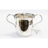 An Irish silver twin handled porringer,