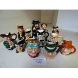 Twelve Dickens character jugs and "Olive