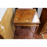 An Edwardian mahogany occasional table