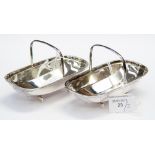 A pair of George V silver baskets in the