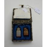 A Chinese boxed set of two jade seals, e