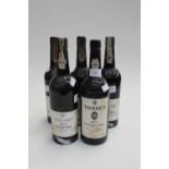 A collection of five bottles of Port, in