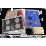 Lockable metal coin case containing comm