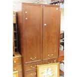 A contemporary mahogany effect wardrobe