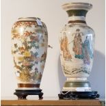 Two Japanese Satsuma vases on hardwood s