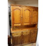 A contemporary pine dresser, the upper s