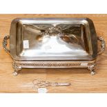 A large plated glass lined serving dish