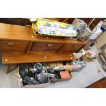 A large collection of various tools, including saws, clamps, drills, screws, coil springs, various