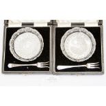 A pair of box cut glass pickle dishes, w