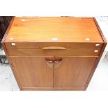 A teak side cabinet