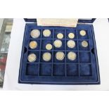 A case containing a selection of coins,