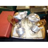 A Picquot stainless tea set and tray and