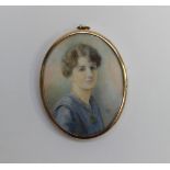 A portrait miniature of a lady, blue eye