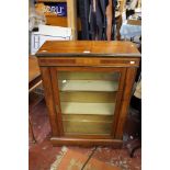 A Victorian walnut cabinet