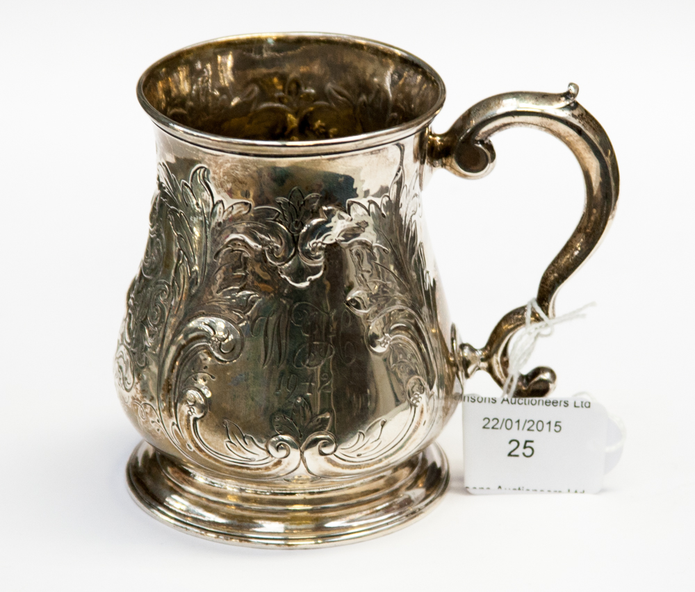 A George II silver baluster shaped mug,