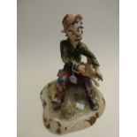A Continental ceramic figure of a tramp