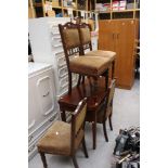 A set of four Victorian dining chairs