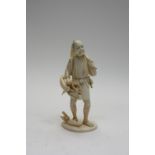 A 19th century Japanese carved ivory fig