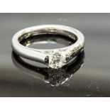 A platinum and diamond solitaire ring, the round brilliant-cut stone approx 0.80ct, ring size M