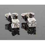 A pair of 18ct white gold and diamond stud earrings, approx 0.40ct total diamond weight