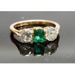 An 18ct gold, emerald and diamond three