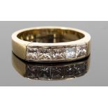 An 18ct gold and diamond five-stone ring, channel set with princess-cut diamonds, each approx