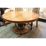 An early 19th century rosewood circular pedestal table, circa 1830, supported on an octagonal