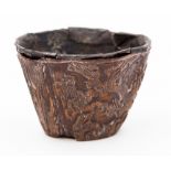 A Chinese carved libation cup, late 17th or early 18th century, decorated in low relief with bamboo