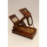 A Victorian figured walnut slide viewer