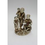 A 19th century gilt ivory figure group o