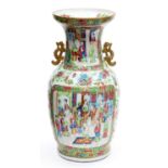 A Chinese Canton famille rose enamelled vase, 19th century, of stout mallet form filled with four