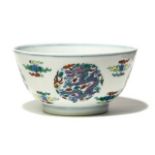 A Chinese bowl, mark of Kangxi, but probably later, the exterior with underglaze polychrome