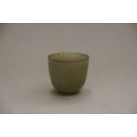 A carved jade cup, of plain round funnel