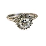 **VENDOR WITHDRAWN** An 18ct white gold and diamond cluster ring, set with a round brilliant cut